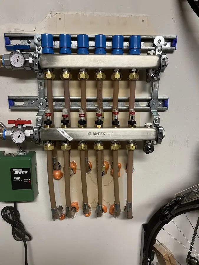 Plumber performing Gas Line Installation at a residential property in Aztec